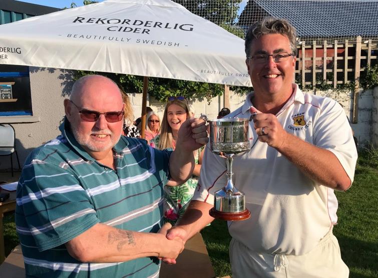 Richard Morris presents his dads trophy to Steve Cole